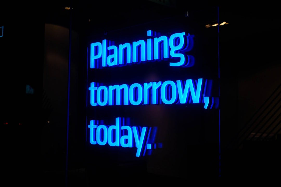 a neon sign that says planning tomorrow, today